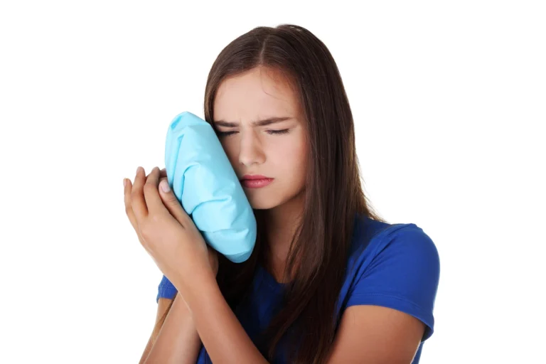 Girl experiencing tothace. Needs root canal therapy raleigh