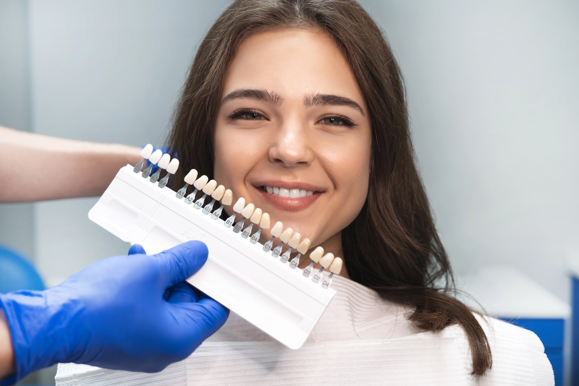 Girl-checking-her-veneers-raleigh-nc Girl checking her veneers raleigh nc