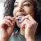 Woman wearing her aligners after getting invisalign raleigh nc