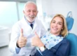 Patient smiling after treatment at raleigh dentistry