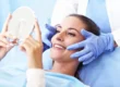 Woman smiling after cosmetic dentistry raleigh