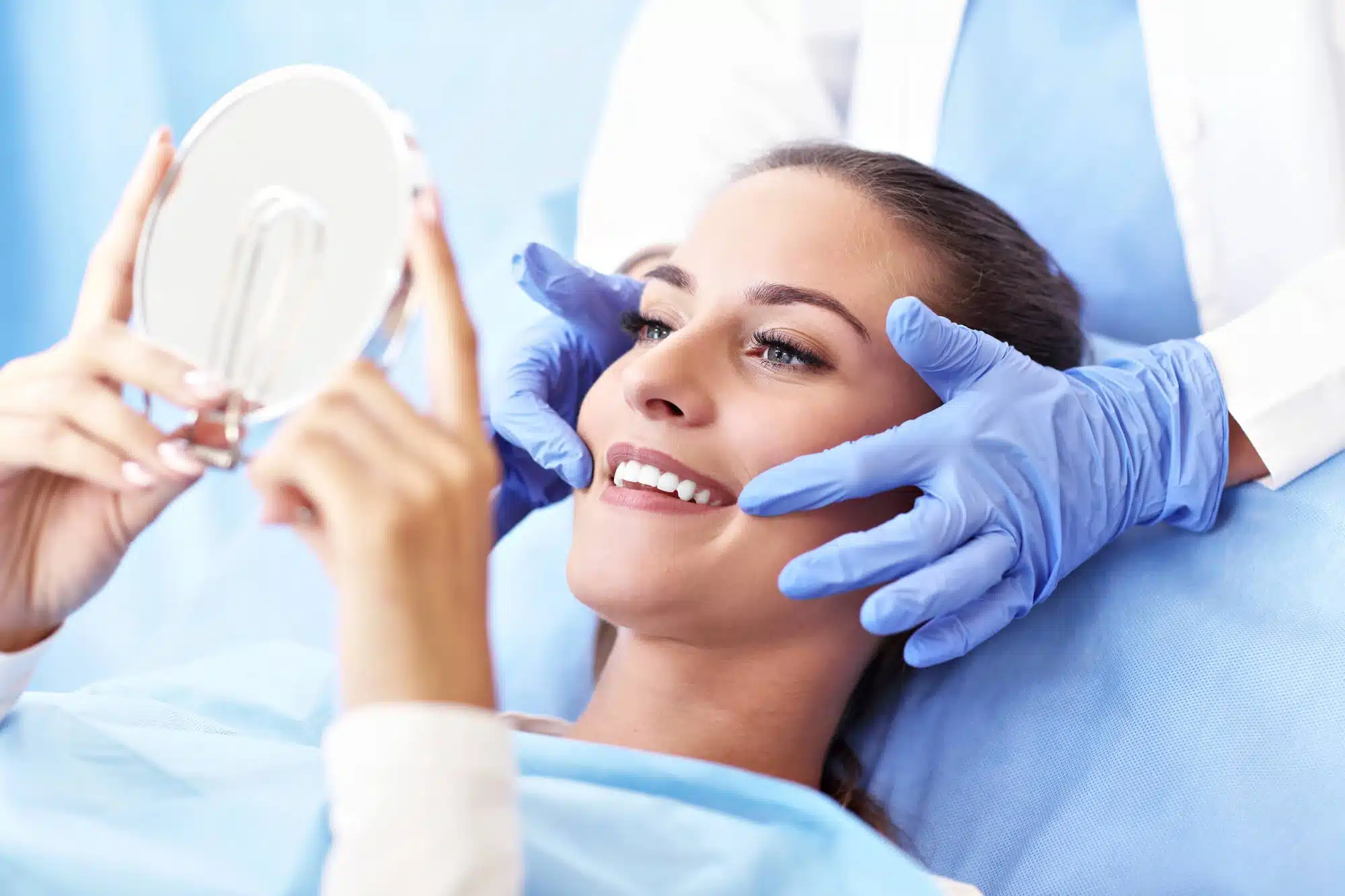 Woman smiling after cosmetic dentistry raleigh