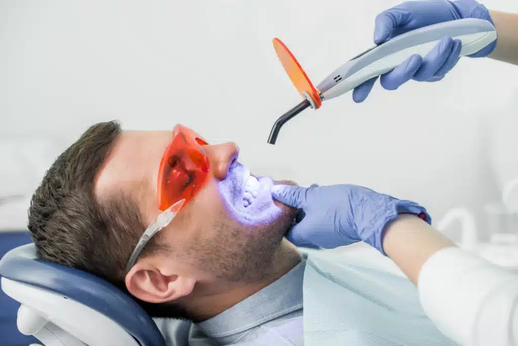 Undergoing-teeth-whitening-raleigh