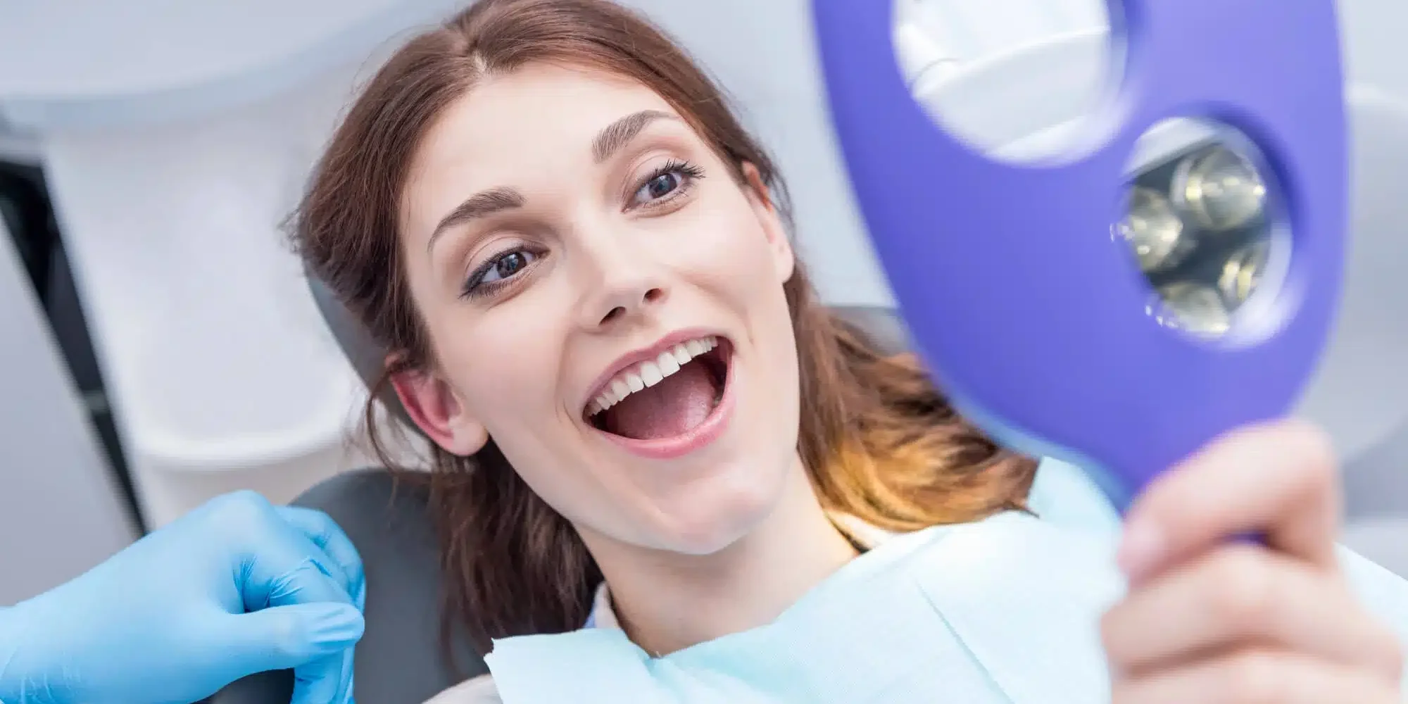 Woman-smiling-after-oral-surgery-raleigh-nc Woman smiling after oral surgery raleigh nc