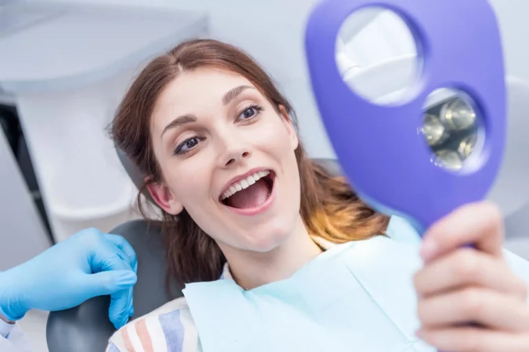 Woman-smiling-after-oral-surgery-raleigh-nc Woman smiling after oral surgery raleigh nc