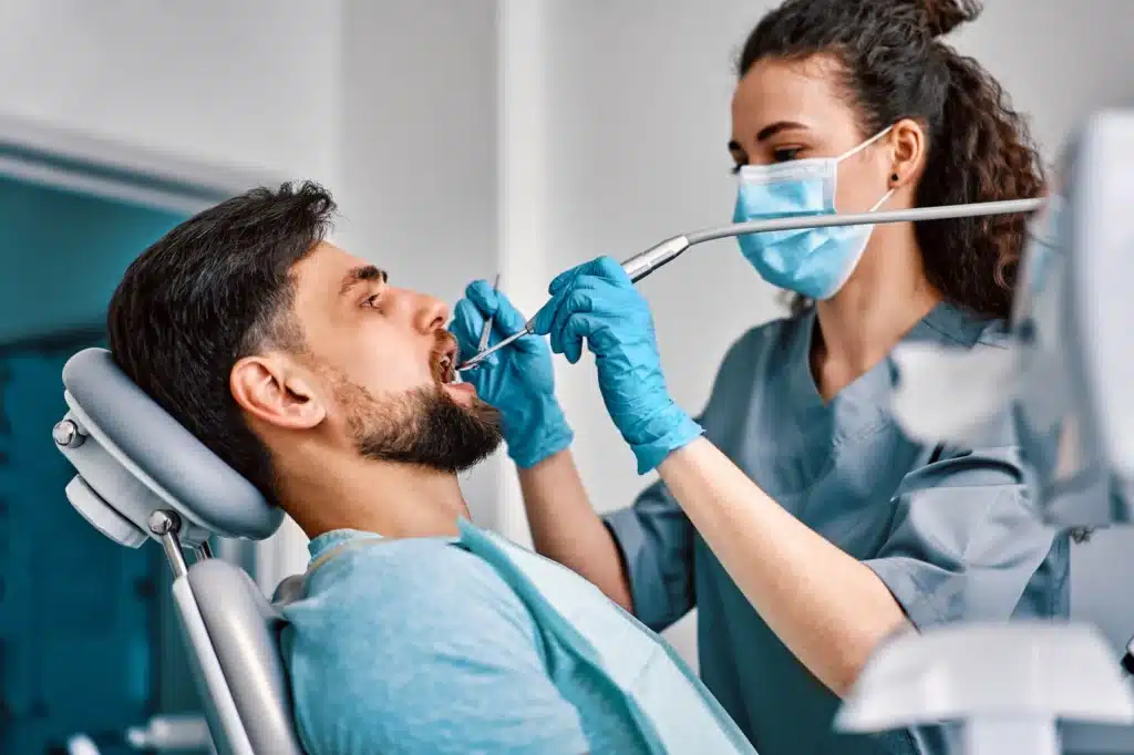 Man-undergoing-dental-bonding-raleigh